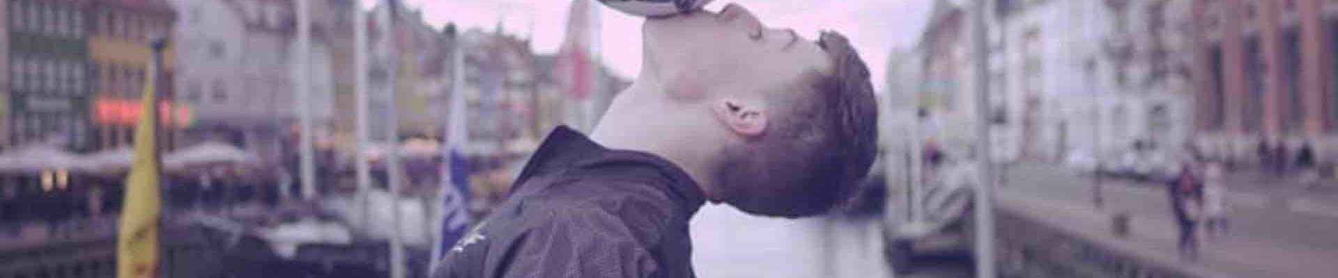 Football-Freestyler-Balancing-Football-On-Chin