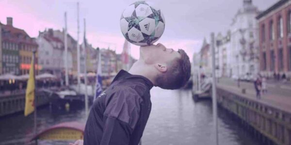 Football-Freestyler-Balancing-Football-On-Chin