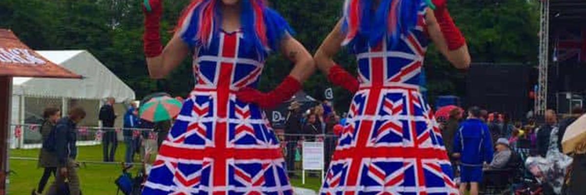 Jolly-British-Stilt-Walker-Duo Jolly-British-Stilt-Walker-Duo