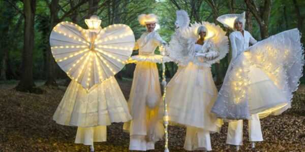 Light-Up-Christmas-Themed-Stilt-Performers