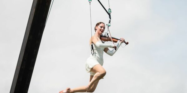 Musician-Hanging-From-Aerial-Rigging