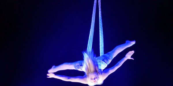 Net-Aerialist-Swings-In-The-Air