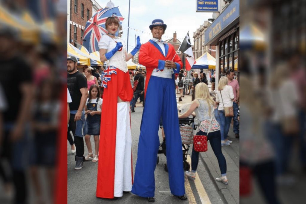 Noble Union Jacks Stilt Walker Duo available to book as a British Themed Entertainment Option for events across the UK.
