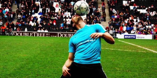 Professional-Football-Freestyler-In-Stadium