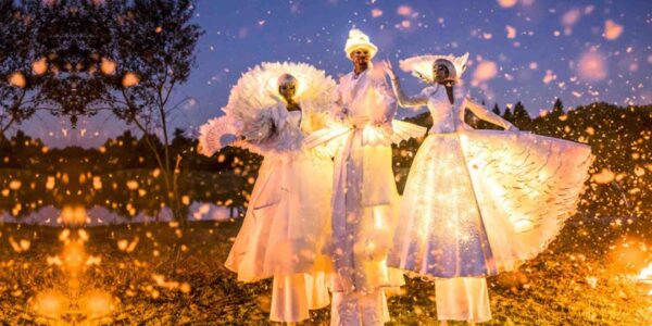 Stilt-Walkers-Wearing-Christmas-LED-Costumes