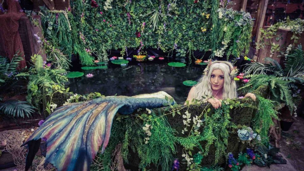 A real-life mermaid for hire in her own enchanted theme pool