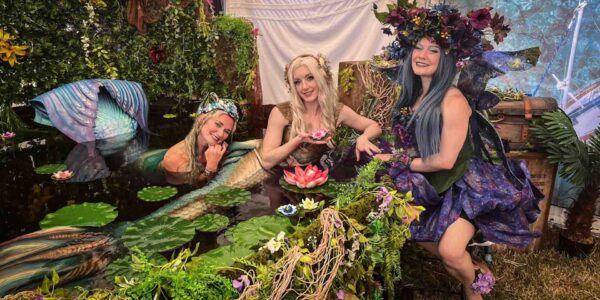 Trio-Of-Mermaid-Performers-With-Pool