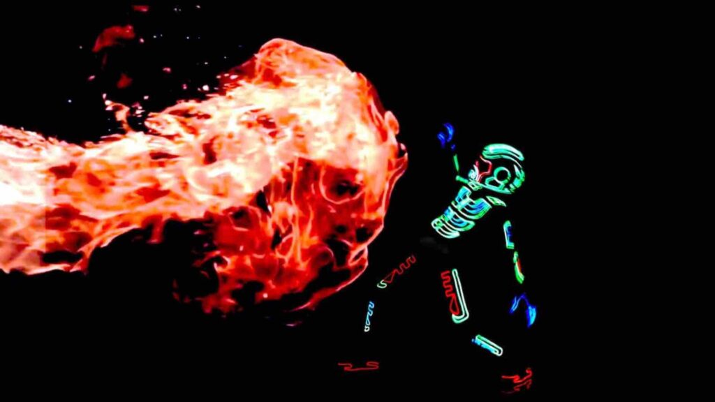 LED Dancer leans away from projected fire