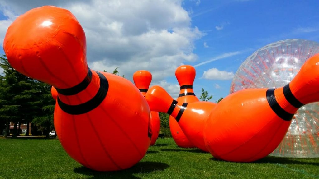 Zorb Bowling game available to book as an activity for your next family fun day or sports event in the UK.