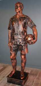 Bronze Footballer Living Statue Performer available to hire for event appearances in the UK.