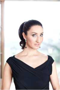 London-based classical singer for hire. Book our soprano opera singer in the UK for award ceremonies or weddings.