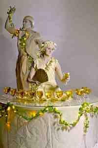 Grecian Human Table for hire. Book our marble-style living champagne tables for corporate events in London & the UK.
