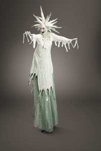 Winter stilt walker for hire. Stilt walker hire London.