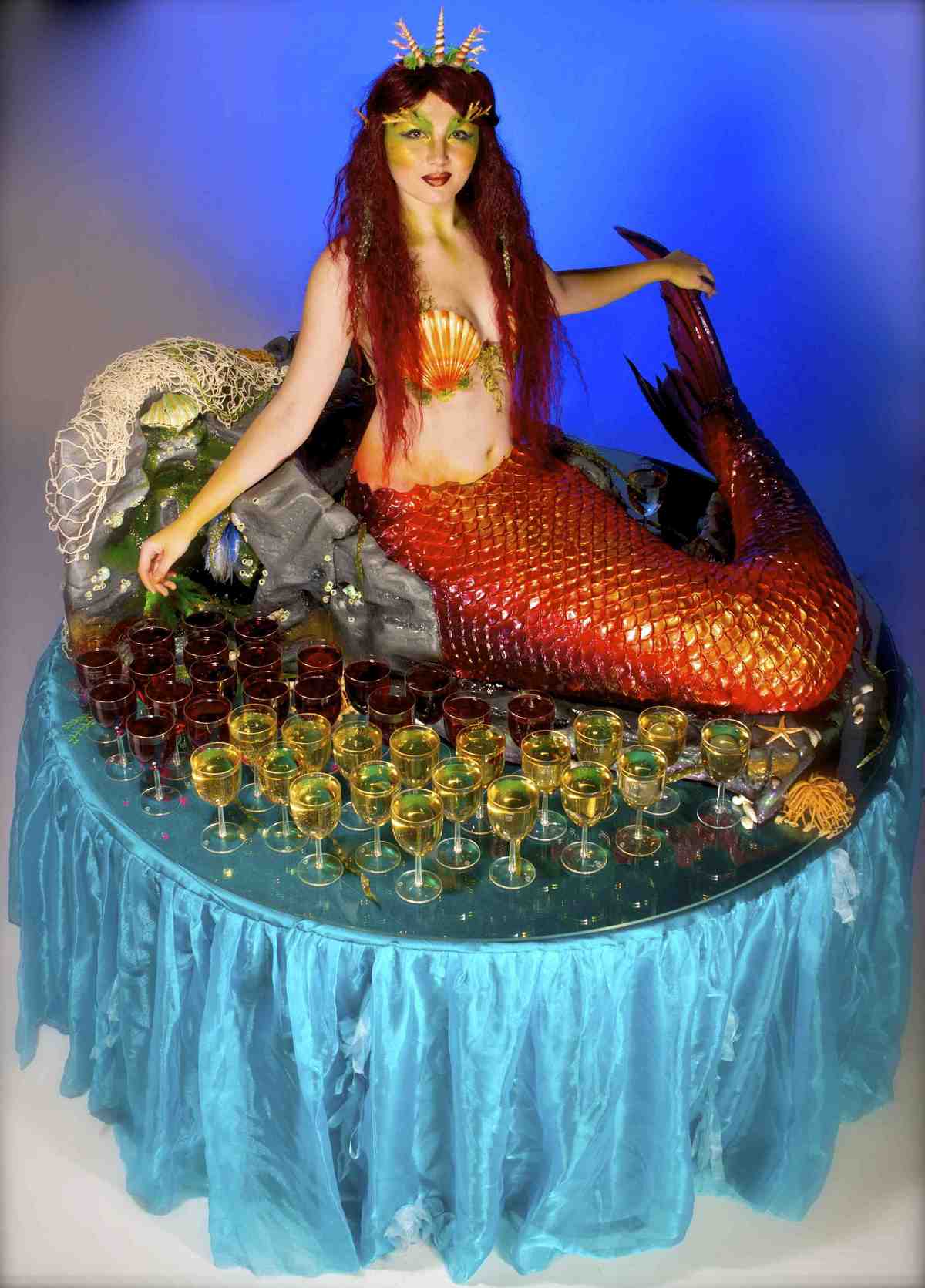 The Human Mermaid Table for hire. Book our Mermaid living table for corporate events, ocean-themed events or eco-themed events in London & the UK.
