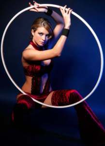 The Astonishing Hula Hooper for hire. Book our hula hoop performer for product launches in London & the UK.
