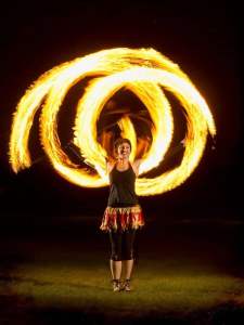 UK-based fire poi show available to hire for festival events.