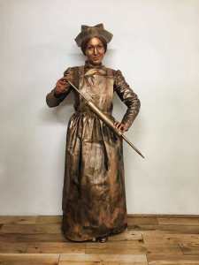 Dickensian-themed bronze nurse human statue for hire.