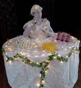 Grecian Human Champagne Tables for hire. Book our Grecian-themed living table for award ceremonies in the UK & London.