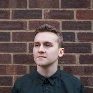 DJ Jones headshot. DJ Jones is available to hire for event appearances across the UK and Internationally.