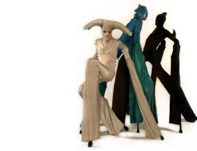 Shark stilt walkers for hire. Our water-themed stilt walkers are available to book for corporate events in London & the UK.