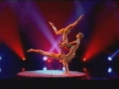 Acrobatics show for hire. Our gold-painted acrobats are available to book for bespoke events in London & the UK.