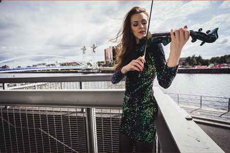 Contemporary violin player. Our Violinist plays both the electric and acoustic violin. For hire in London and the UK.