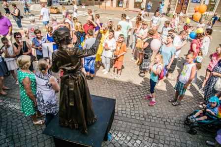 Bronze Living Statue performing at a public event in the UK. Available for hire across the UK.