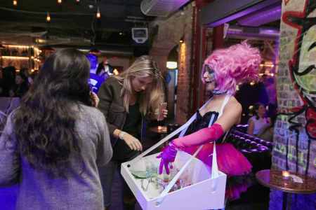 Sinister Circus Candy Girl for hire. Book our Candy catering girl for Halloween-themed events in London & the UK.