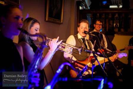 Live Function Band for hire. Jazz Town is available to book for corporate events in the UK & London.