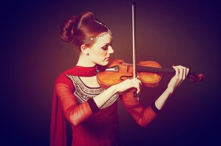 Violinist hire. Our professional Violin player can be hired in London and the UK.