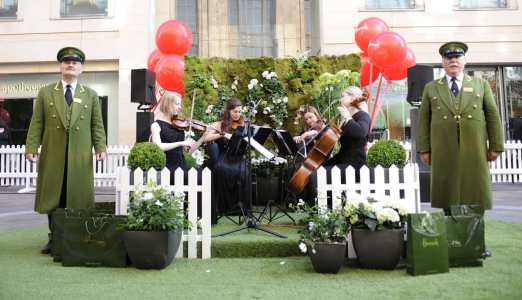 Classical string ensemble for hire performing outside Harrods.