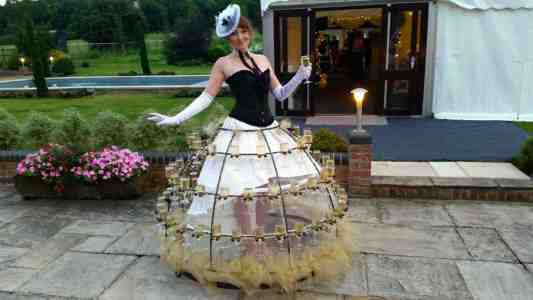 The Chic Champagne Table for hire. Book our walkabout champagne tables for corporate events in the UK & London.