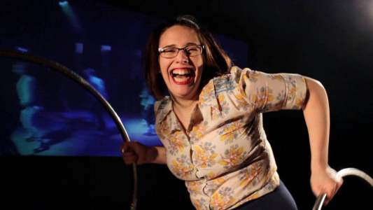 70's-themed hula hoop dance act for hire. Book our comedy hoop act for weddings in the UK & Bristol.