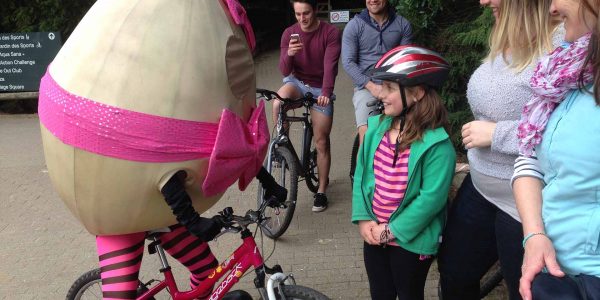 Boiled-Eggs-Pink-Character-On-Bike