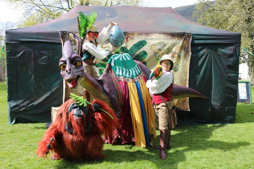 Walkabout animals & explorers for hire. Book our walkabout animal puppet show for summer festivals in London & the UK.