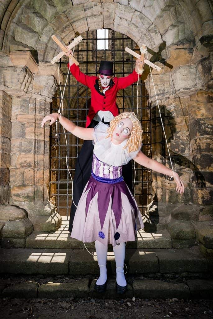 Creepy Ringmaster & Puppet for hire. Our Ringmaster Stilt Walker & Puppet on strings are available to book for Halloween-themed events in London & the UK.