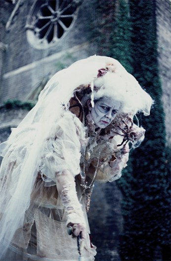 Halloween stilt walker for hire. Our Miss Havisham Stilt Walker is available to book for Dickensian-themed events in London & the UK.
