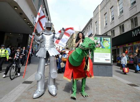 St. George's Day stilt walkers & dragon for hire. Our St. George's Stilt Walker is available to book for family fun days in the UK & London.