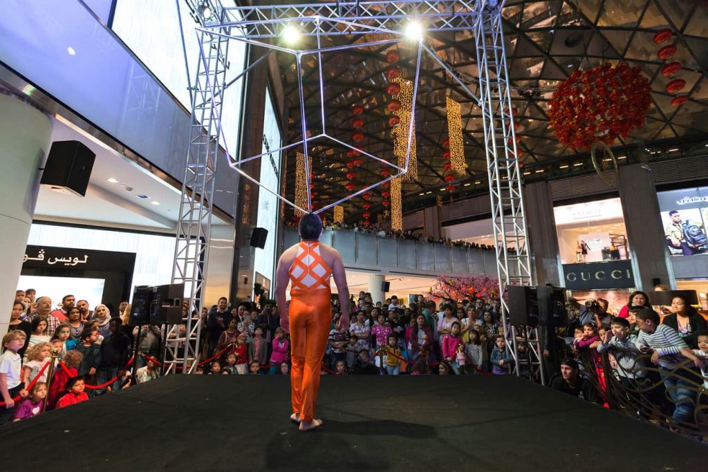 Cirque Shanghai performing in front of a huge crowd at a Dubai Shopping Centre. Book our high-end Chinese New Year Show and Production.