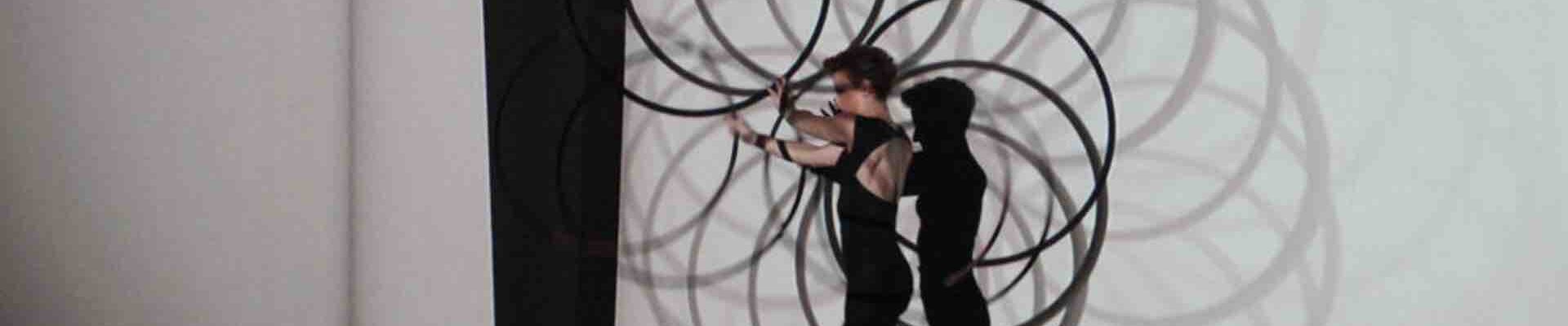 Hula-Hoop-Performers-Create-Shadows Hula-Hoop-Performers-Create-Shadows