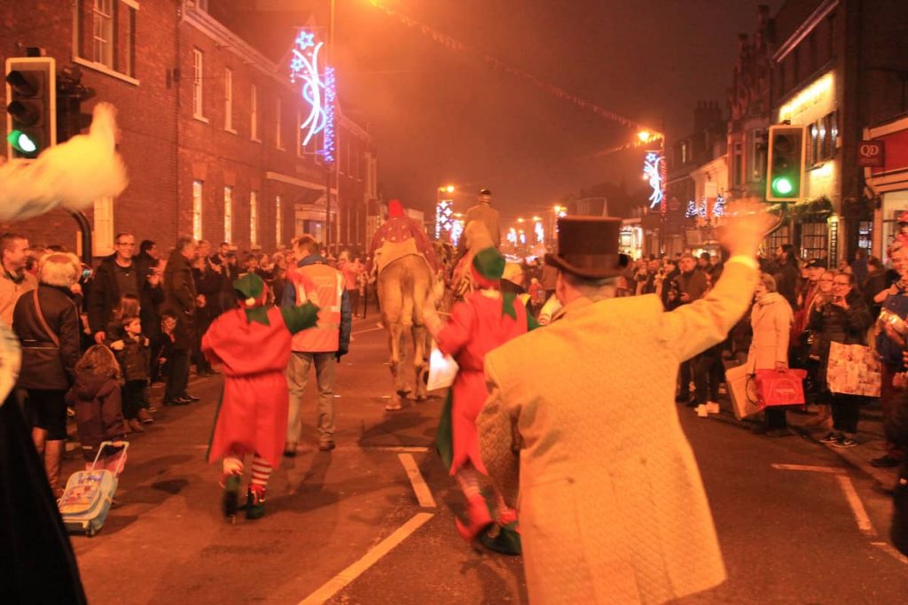 Performing walking through the Street interacting with viewers at our Newmarket Christmas Parade. This Christmas Parade led to the Christmas Lights where we did a Christmas Light Switch on Ceremony.