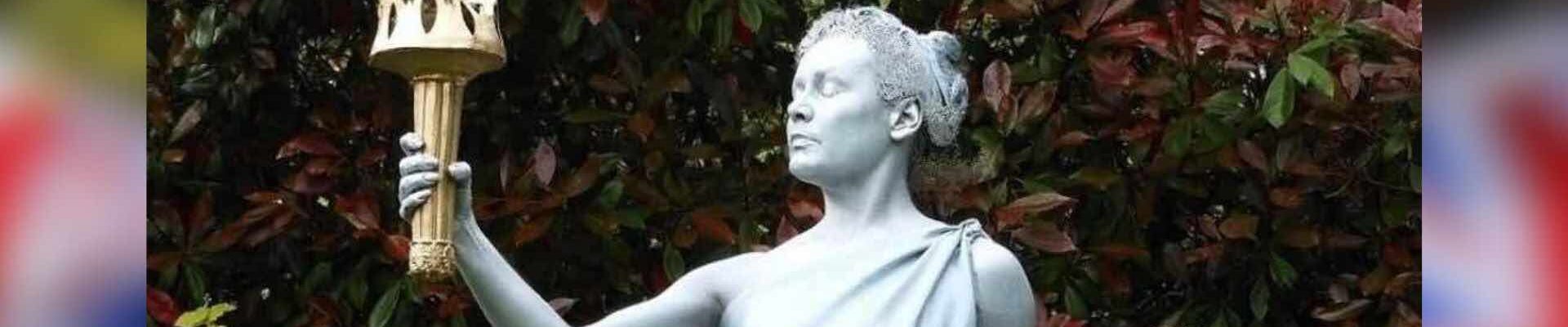 Olympic living statues torch bearer.