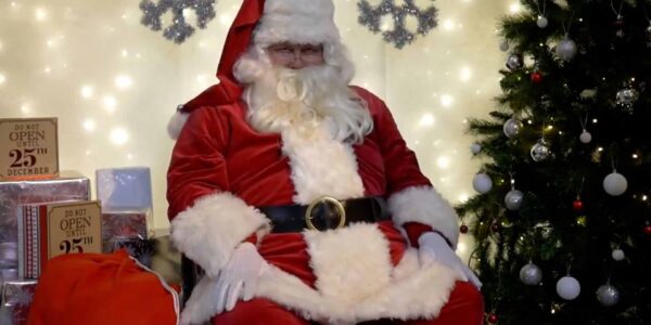 Santa-Entertainer-Sitting-In-Grotto