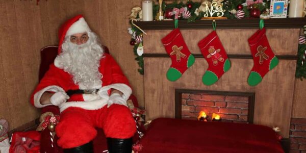 Santa-Sitting-In-Grotto