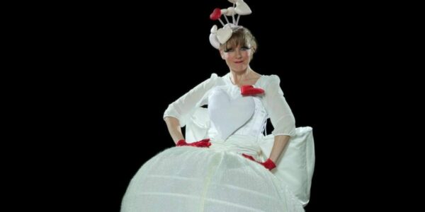 White-And-Red-Heart-Stilt-Performer