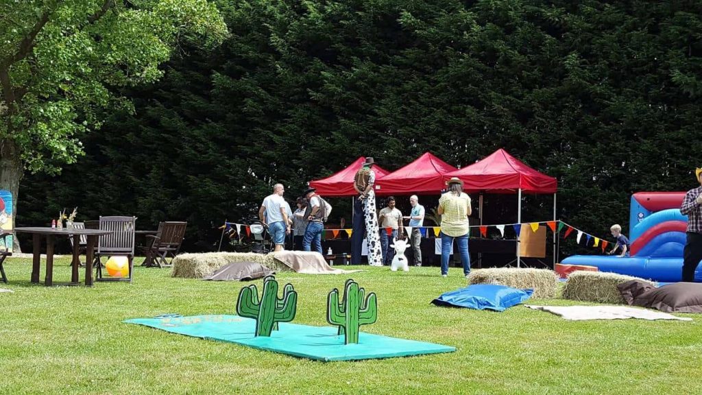 Wild West themed Corporate Fun Day event where we supplied the attractions, tents and decorations on top of managing the event.