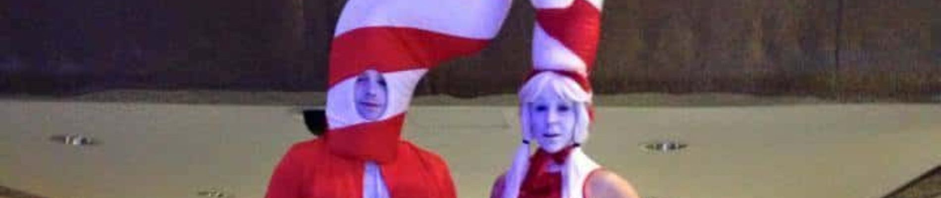candy cane stilt walkers
