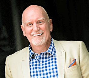 Hire a best-selling author for your corporate event in London and the UK