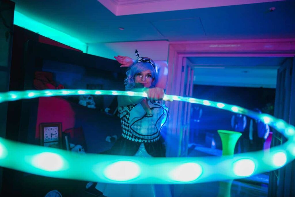 LED Hoop Performer used to entertain guests at the Alice In Wonderland Themed Christmas Party.