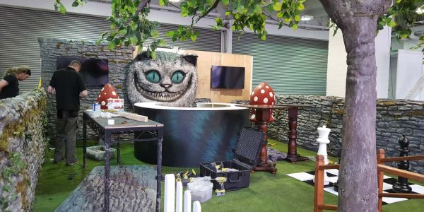 Setting-Up-The-Alice-In-Wonderland-Exhibition-Stand